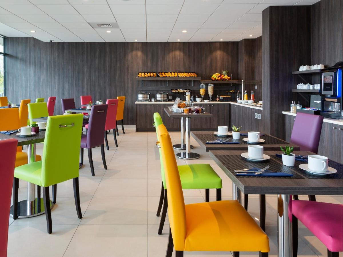 Hotel Roi Soleil Prestige Plaisir - St Quentin Экстерьер фото