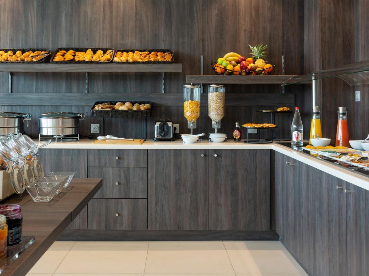 Hotel Roi Soleil Prestige Plaisir - St Quentin Экстерьер фото